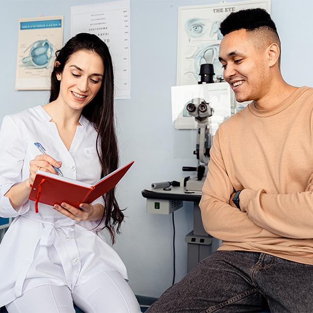 optometrist with patient