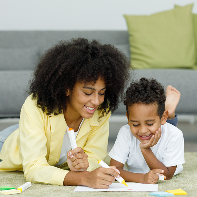 mom helping son with homework